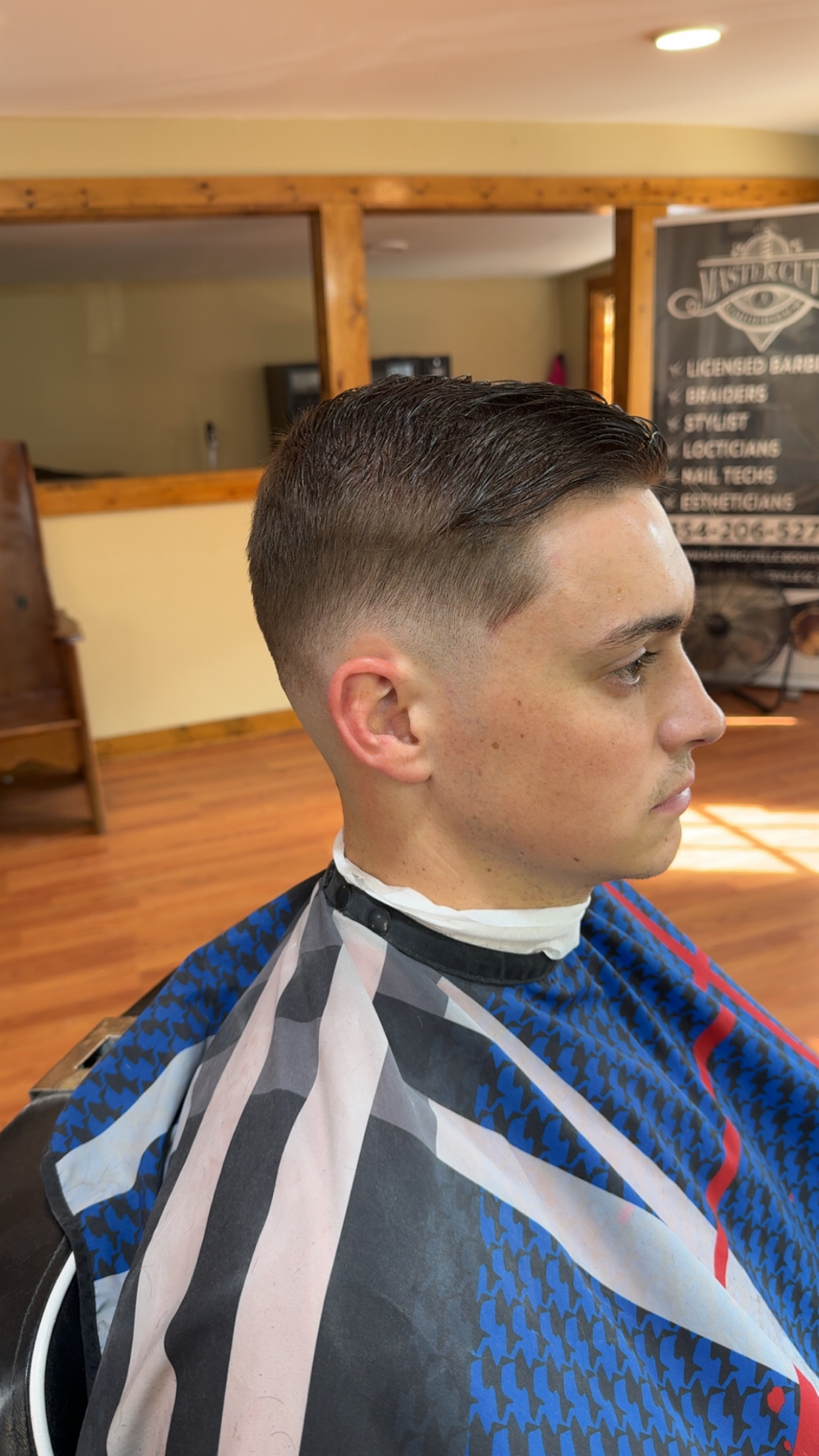 Side part with a clean fade