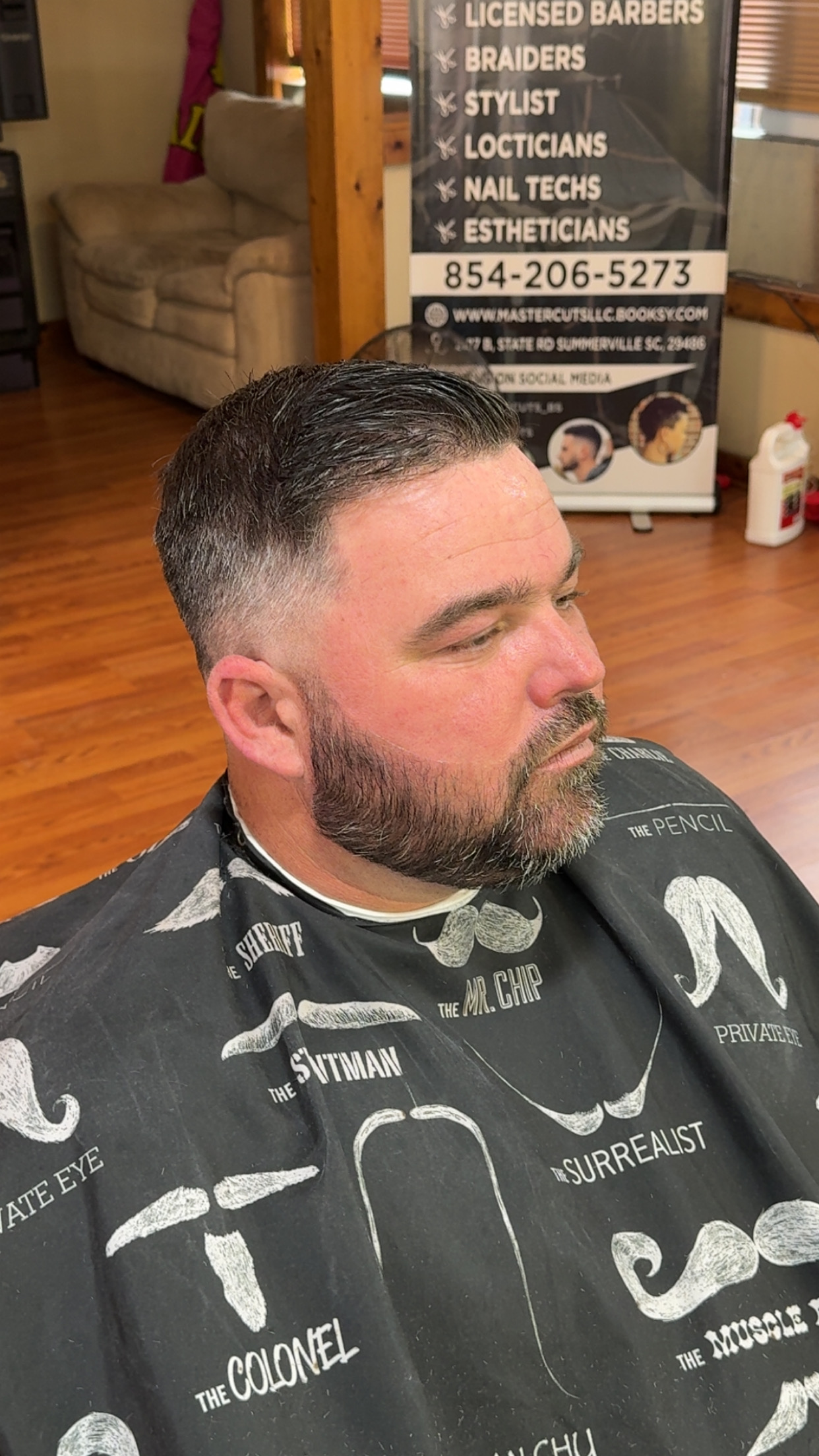 Fade with a full shaped beard