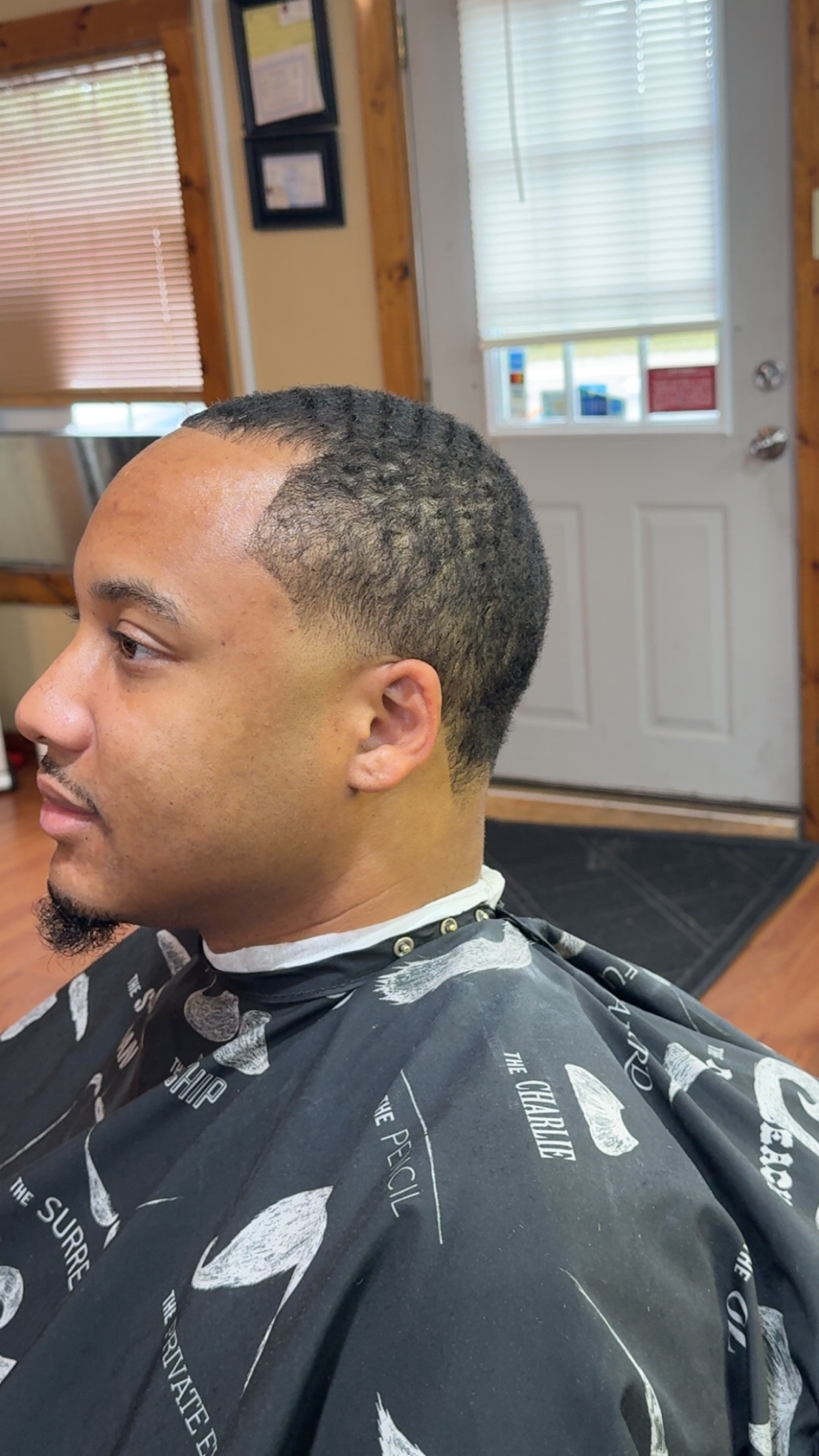 Low fade with a lined up hairline